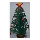 Christmas tree with small ornaments and yellow star