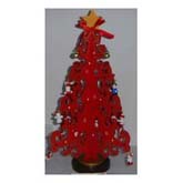 Red christmas tree with small ornaments and yellow star