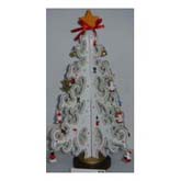 White christmas tree with small ornaments and yellow star