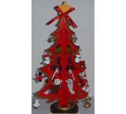 Red solid christmas tree with two santa clauses